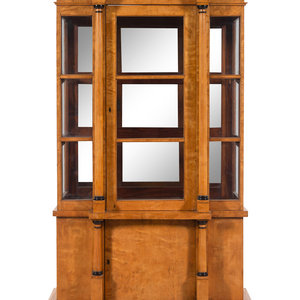 Appraisal: A German or Austrian Neoclassical Parcel Ebonized Birch Breakfront Vitrine