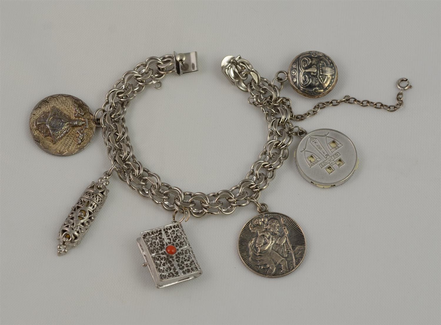 Appraisal: Sterling silver charm bracelet charms some unmarked TO