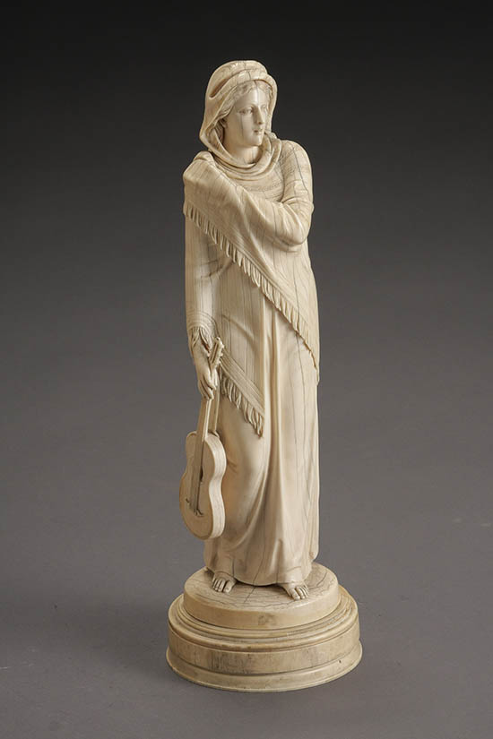 Appraisal: Continental Ivory Figure of a Woman with a Guitar Probably