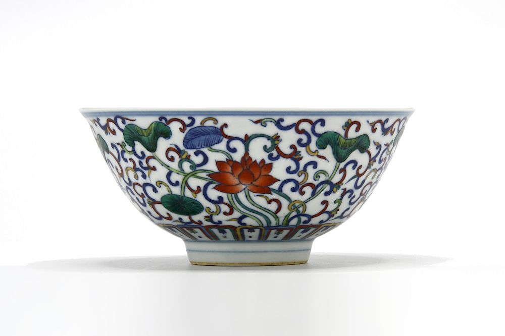 Appraisal: Doucai 'Lotus' Bowl The deep rounded sides rising from a