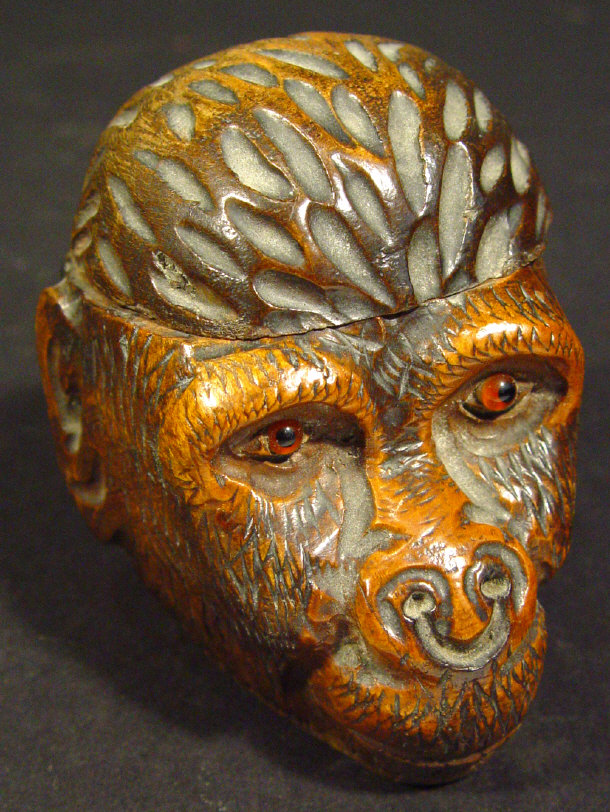 Appraisal: Black Forest carved wooden chimp's head inkwell set with glass