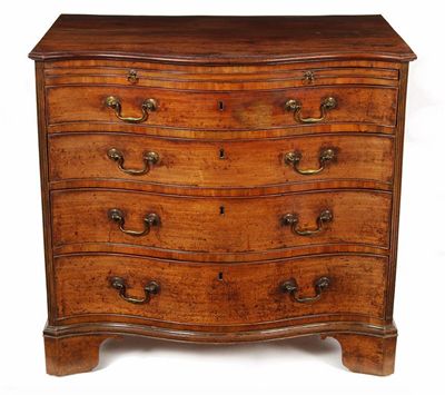 Appraisal: A George III mahogany serpentine commode the moulded edge top