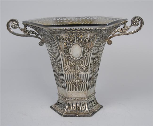 Appraisal: CONTINENTAL SILVER RETICULATED TWO HANDLED HEXAGONAL CENTER VASE with glass