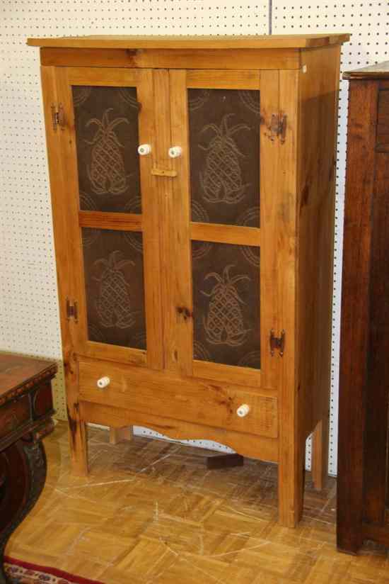 Appraisal: PINE PIE SAFE WITH FOUR PIERCED-TIN PANELS Two doors and