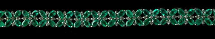 Appraisal: Fourteen-Karat White Gold Emerald and Diamond Bracelet the flexible strap