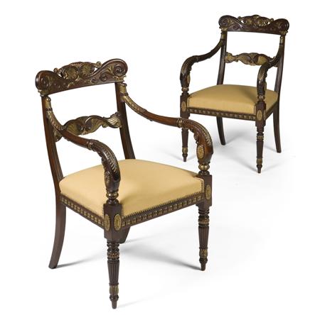 Appraisal: PAIR OF NORTH ITALIAN WALNUT AND PARCEL GILT OPEN ARMCHAIRS