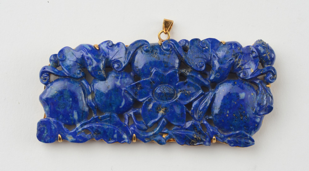 Appraisal: LAPIS LAZULI PENDANT Carving depicts fruit flowers and rat K