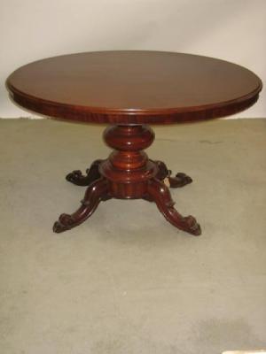 Appraisal: A VICTORIAN MAHOGANY LOO TABLE the moulded edged tip up