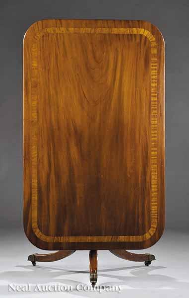 Appraisal: A George III-Style Inlaid Mahogany Dining Table th c rectangular