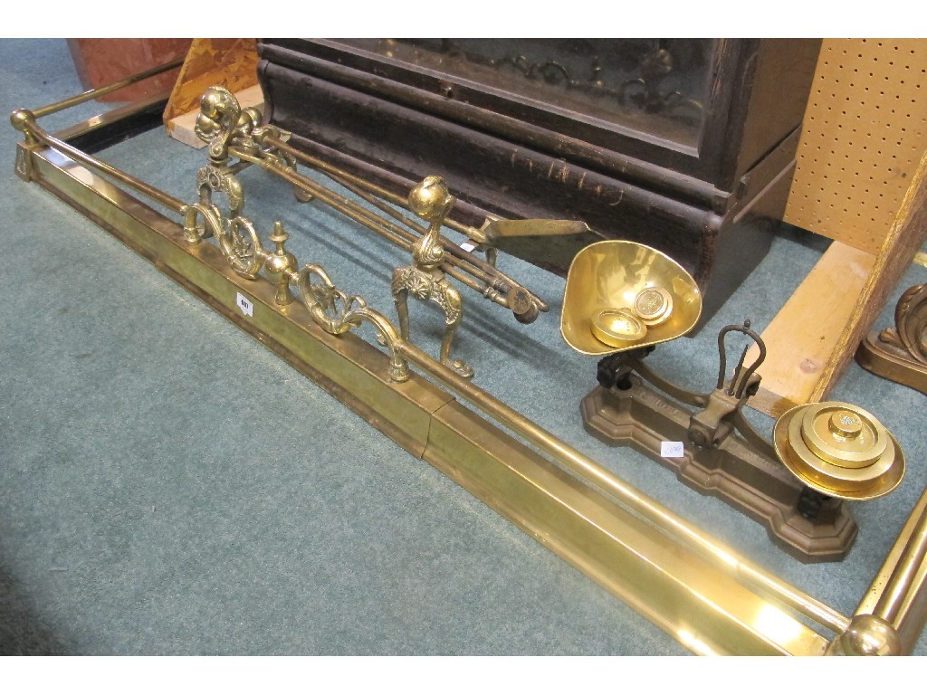 Appraisal: Brass extending fire fender set of brass fire dogs and