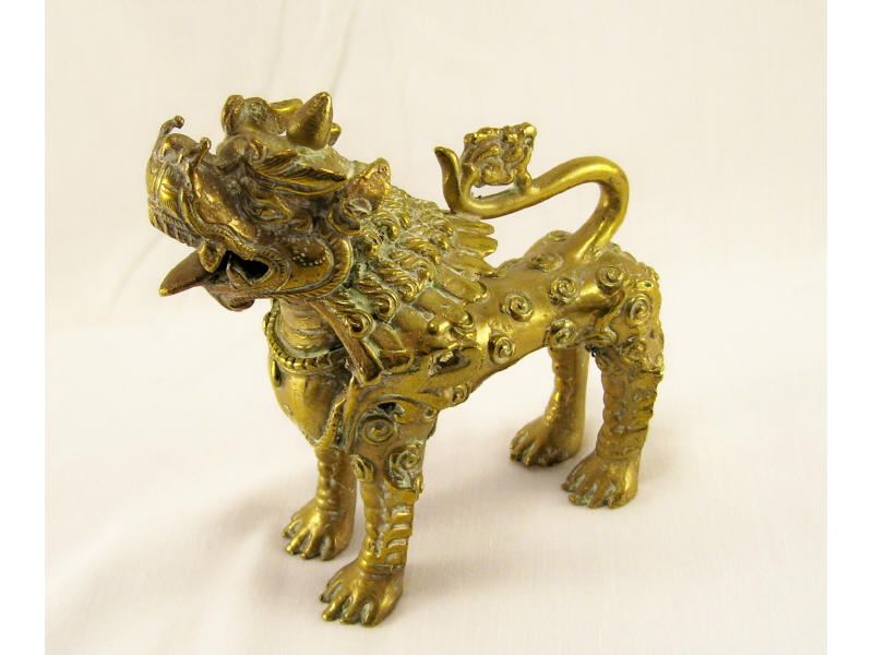 Appraisal: Brass Foo Lion Cast brass Oriental style foo-lion Measures high