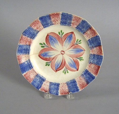 Appraisal: Blue and red rainbow spatter plate th c with dahlia