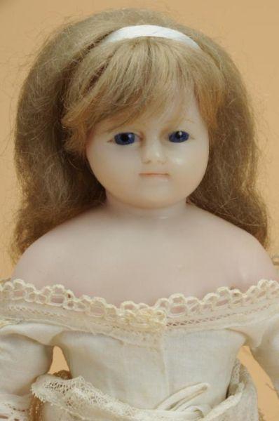 Appraisal: English Poured Wax Doll England ca poured wax shoulder head