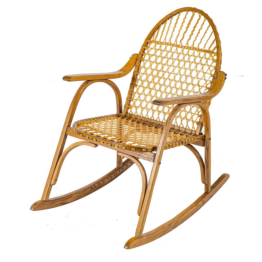 Appraisal: Vermont Tubbs oak and rawhide rocking chair stamped Vermont Tubbs