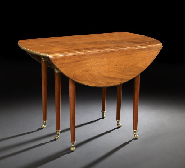 Appraisal: Directoire Mahogany Dining Table ca the brass-bound ovoid top with