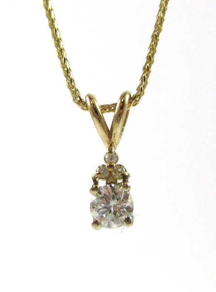 Appraisal: DIAMOND PENDANT NECKLACE suspended on an inch k yellow gold