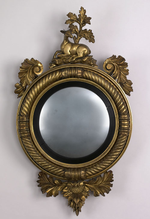 Appraisal: English giltwood convex mirror ca bearing the label of Thomas