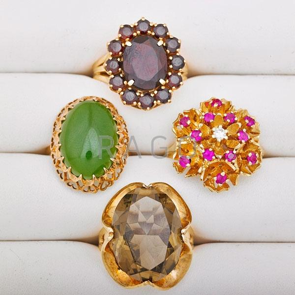 Appraisal: FOUR YELLOW GOLD GEM SET RINGS Condition Report