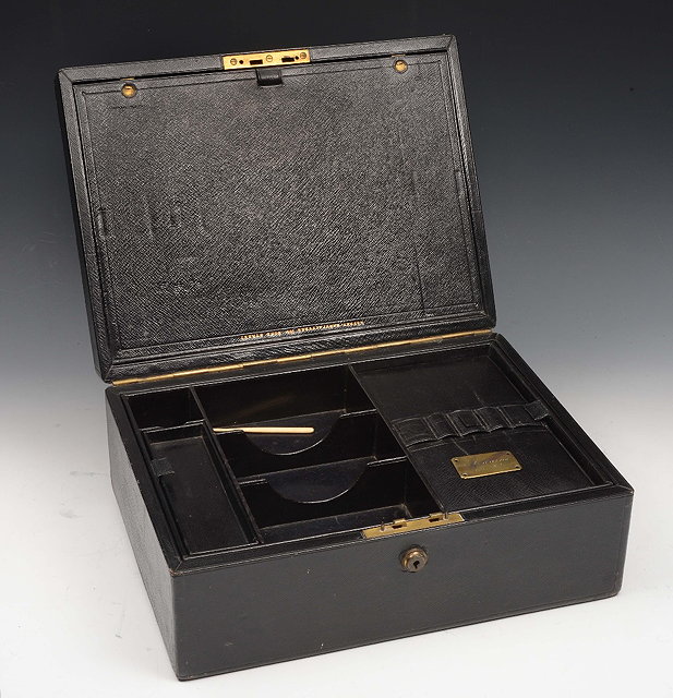 Appraisal: A LEATHER CORRESPONDENCE BOX with fitted interior by Asprey Bond