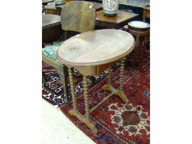 Appraisal: OVAL LAMP TABLE W SPOOL TURN LEGS