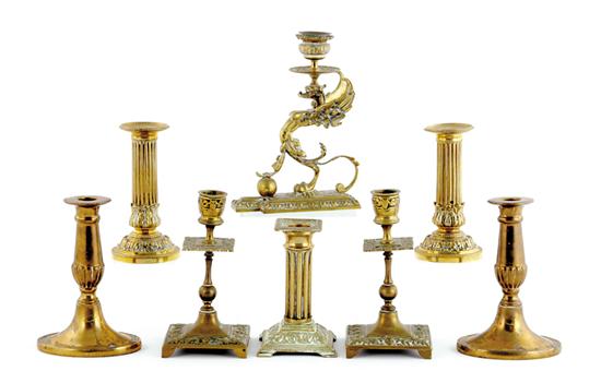 Appraisal: Collection of brass candlesticks pair of columnar form H pair