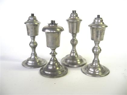 Appraisal: Four pewter whale oil lamps e smith Including a pair