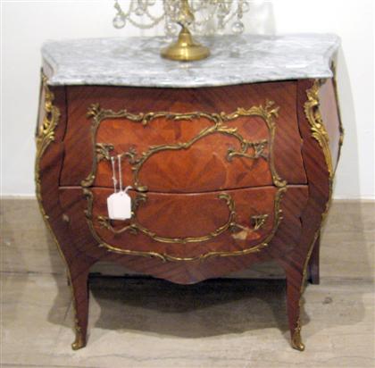 Appraisal: Pair of bombe parquetry and marble commodes The serpentine gray