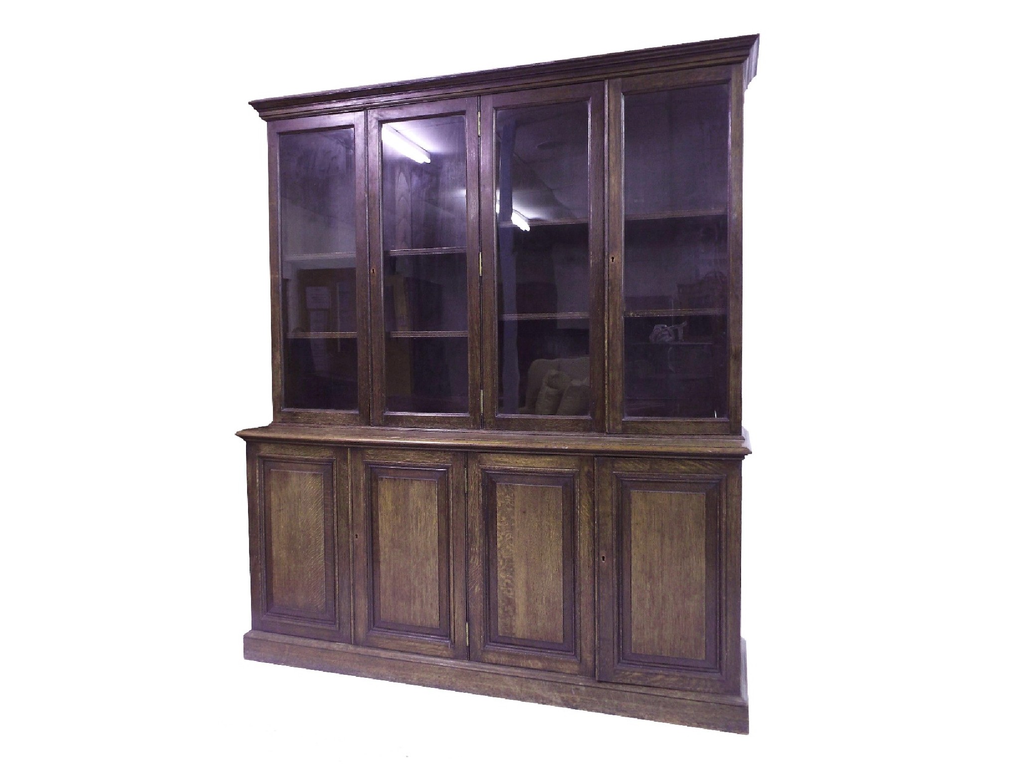 Appraisal: Late th century oak twin panelled library bookcase the top