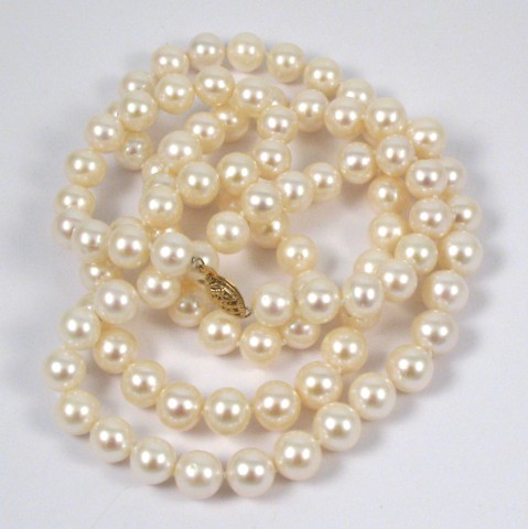 Appraisal: PEARL AND FOURTEEN KARAT GOLD NECKLACE strung with well matched