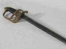 Appraisal: A Victorian officer's sword with brass guard sharkskin grip and