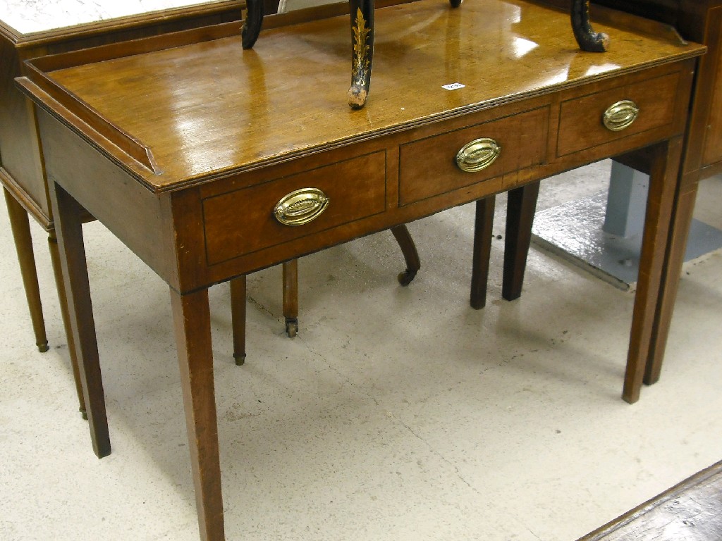 Appraisal: Regency mahogany writing table the reed moulded top over a