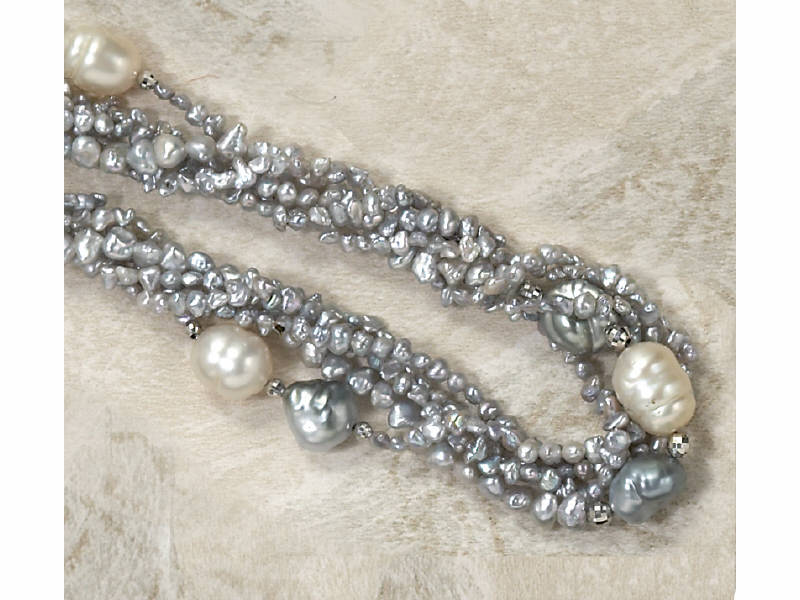 Appraisal: TAHITIAN KESHI PEARL NECKLACE A strand Silver grey Tahitian keshi