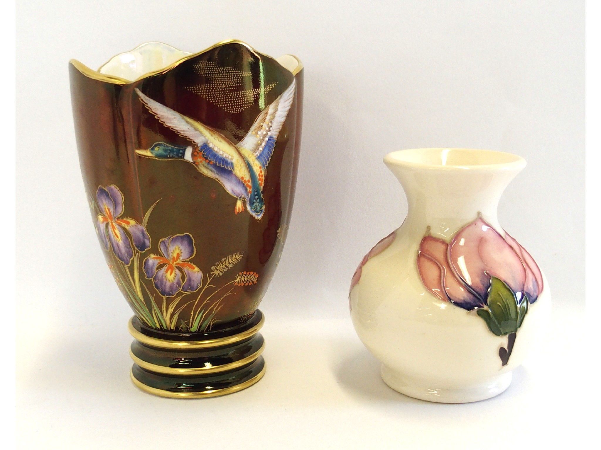 Appraisal: Moorcroft Magnolia vase and a Carlton Ware Mallard vase