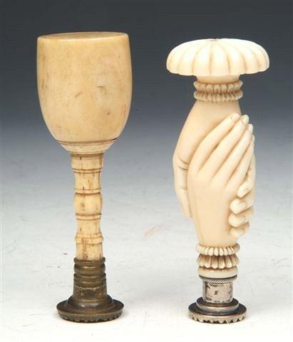 Appraisal: AN IVORY SEAL in the form of clasped hands high