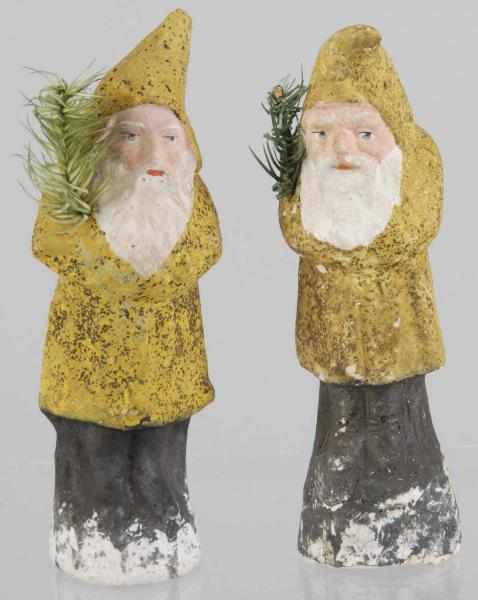 Appraisal: Lot of Belsnickel Santas Description Both wearing yellow coats and