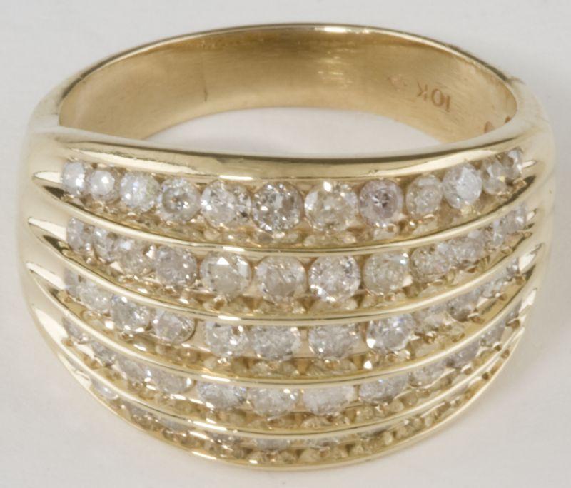 Appraisal: Gold and Diamond Ring set with five rows of round