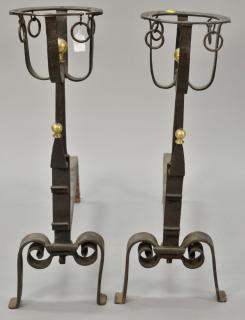 Appraisal: Pair of iron andirons with circular tops on plain shafts