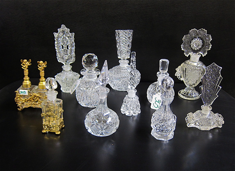 Appraisal: ELEVEN ASSORTED PERFUMES includes clear cut and molded glass bottles