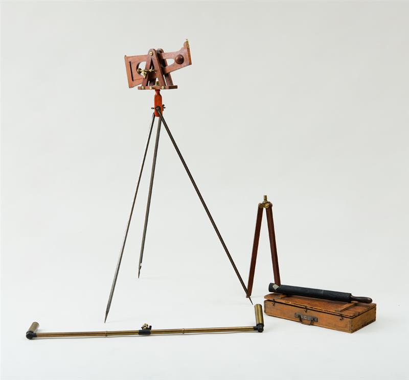 Appraisal: STAINED WOOD AND BRASS-MOUNTED SURVEYING TOOL ON A TRIPOD BASE