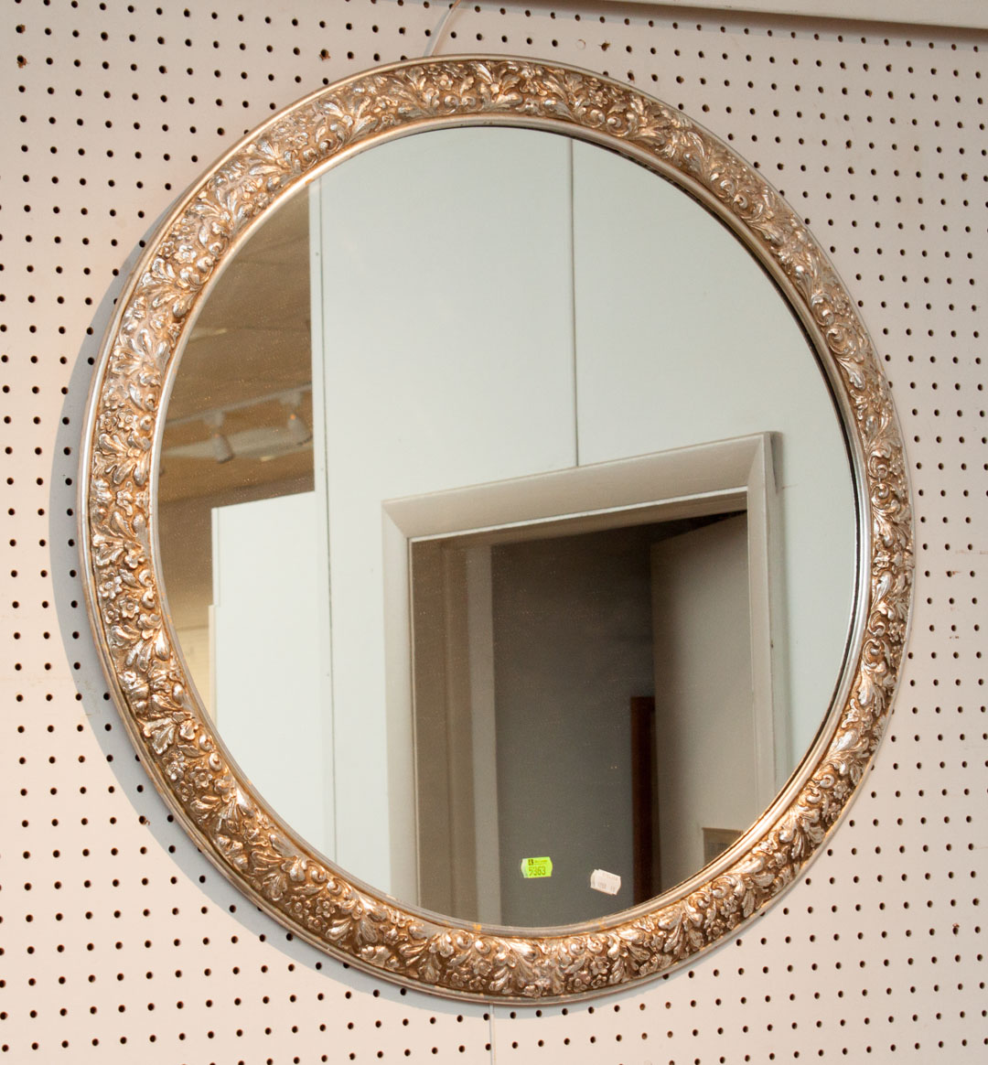 Appraisal: Silvered wood round mirror