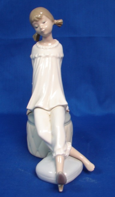 Appraisal: Girl With Mother's Shoe - Retired Good Condition U S