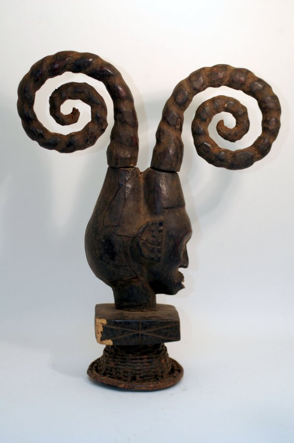 Appraisal: Ekoi cephalomorphic headdress of carved wood covered with animal skin