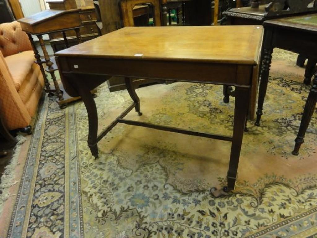 Appraisal: A th century mahogany sofa table raised on square cut