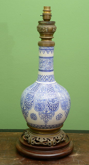 Appraisal: AN OLD ISLAMIC STYLE POTTERY VASE with bronze mounts previously