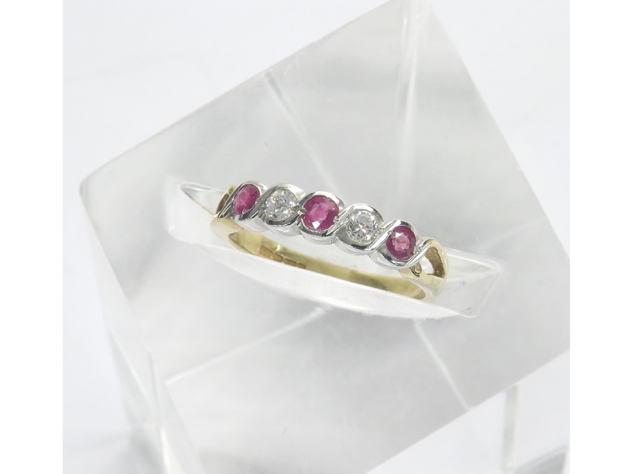 Appraisal: ct ruby and diamond five stone half eternity ring ring