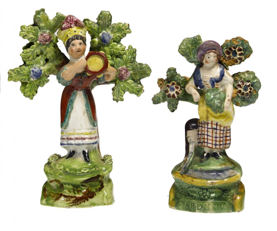 Appraisal: A STAFFORDSHIRE PEARLWARE FIGURE OF A GARDNER'S COMPANION AND A