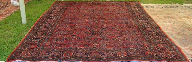 Appraisal: ORIENTAL RUG HAMADAN ' x ' Symmetrical arrangement of scrolling