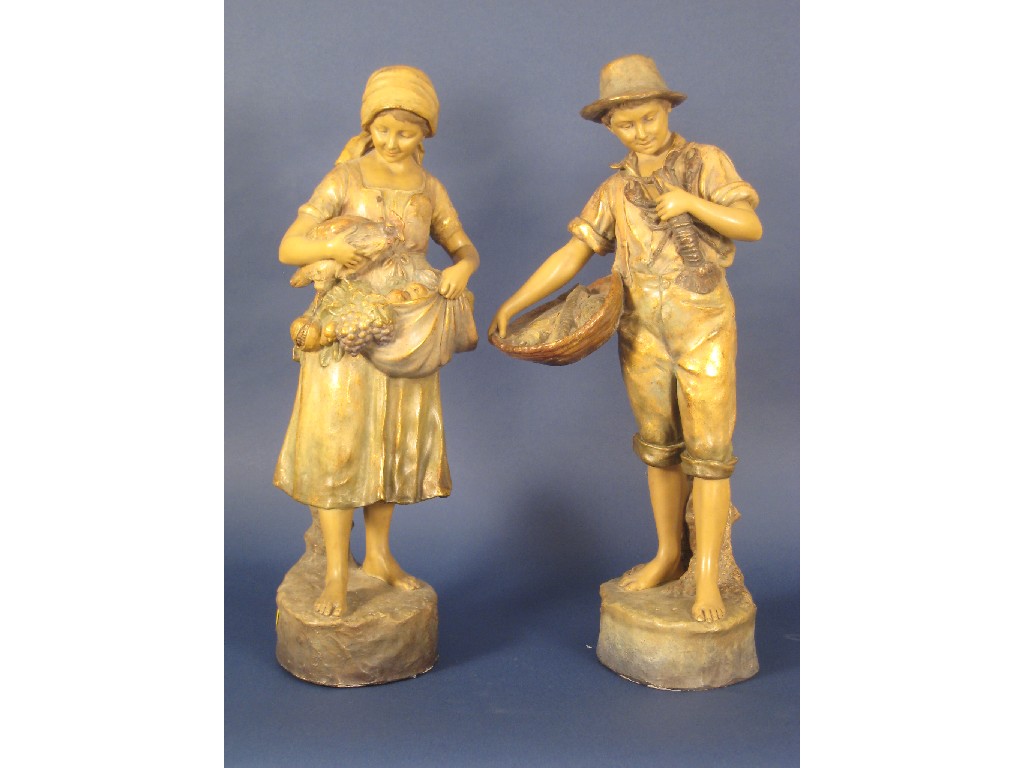 Appraisal: A Goldscheider Figure of Fisher Boy with basket of fish