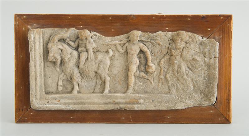 Appraisal: CAST-STONE FRAGMENT AFTER THE ANTIQUE Relief-cast with Silenus riding a