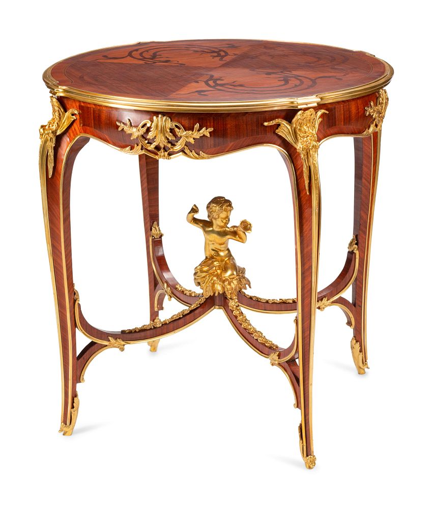 Appraisal: A Louis XV Style Gilt Bronze Mounted Marquetry Table A